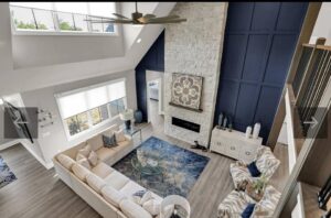 image of large blue and white living room, taken from above