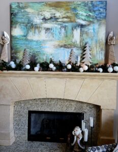 portfolio image of blue and silver christmas decor on a mantle