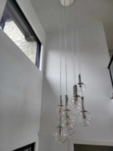 portfolio image of creative hanging ceiling lamp in home entryway