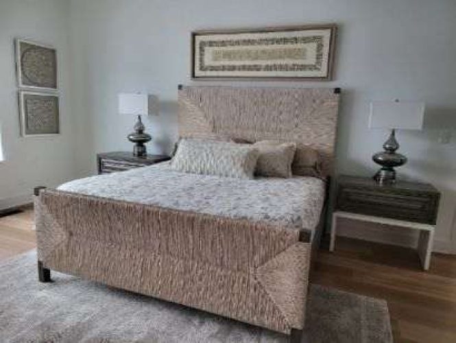 portfolio image of bedroom with wicker bed frame