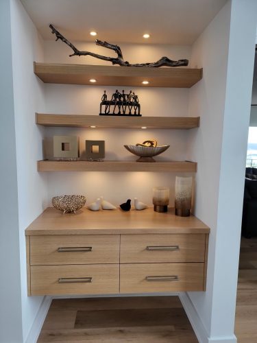 portfolio image of an alcove with decorations and cabinets
